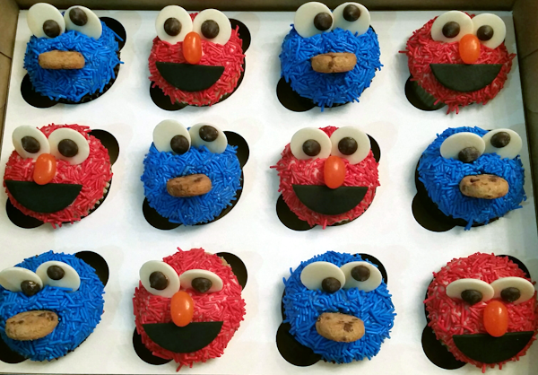 cupcakes that look like Elmo and the Cookie monster