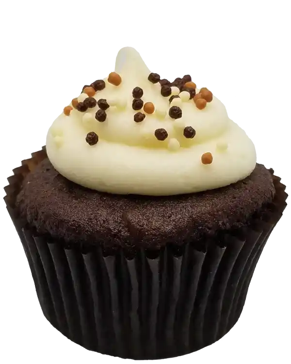 Chocolate cupcake filled with English toffee and chocolate ganache, topped with variegated mini crisp pearls.